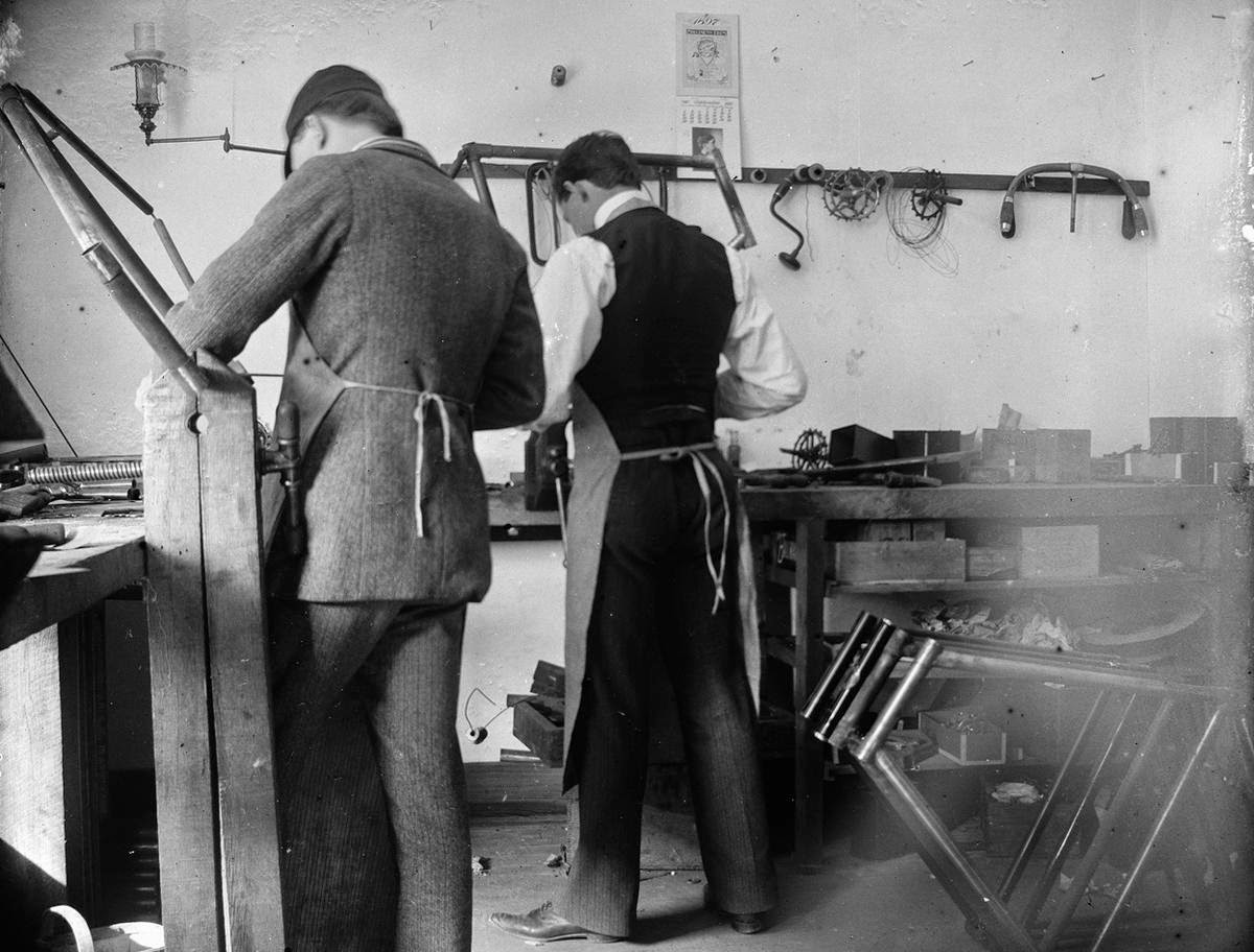 image alt Wright brothers in their workshop
